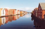 Old warehouses by the river Nidelven